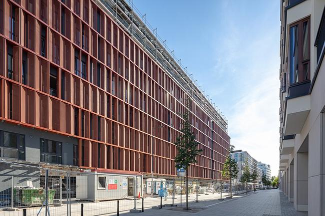 Apartamenty przy Warzelni ubrane w miedzianą elewację